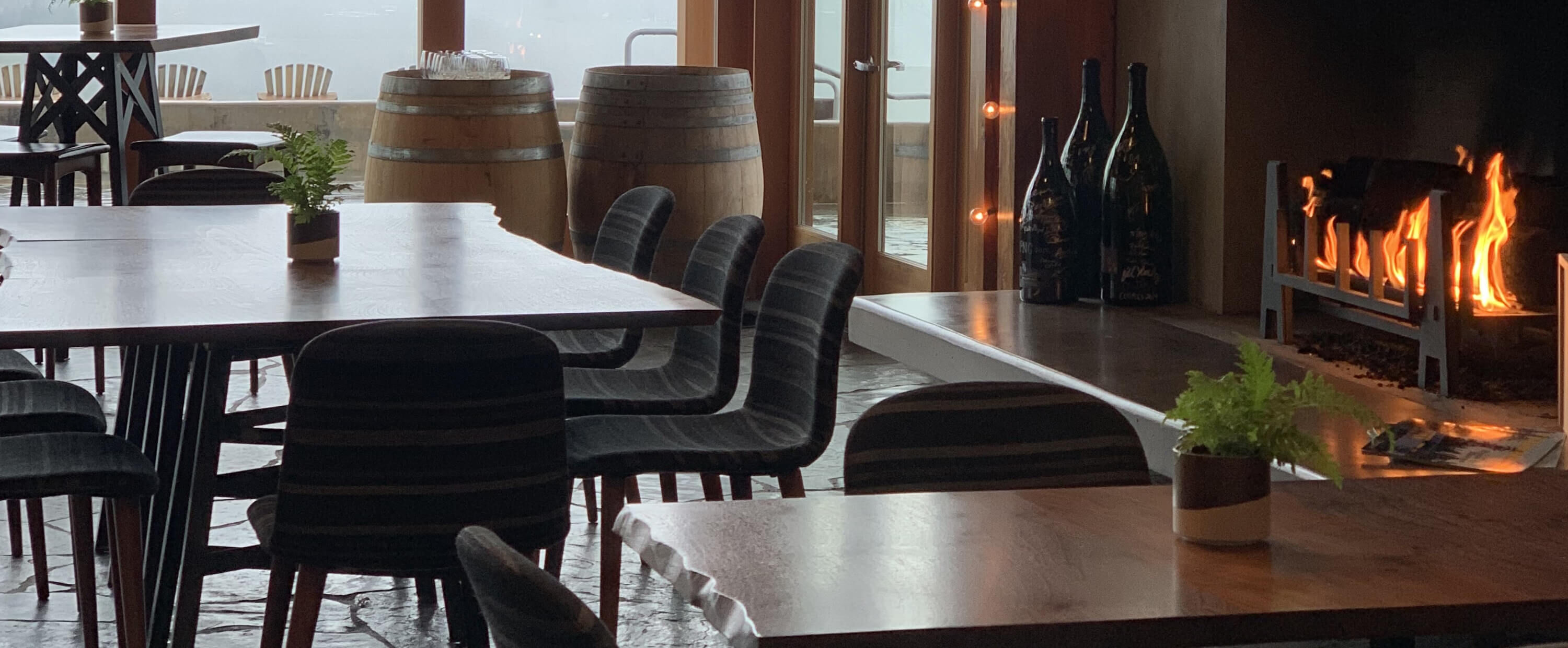 Penner-Ash Tasting Room with fire going in the fireplace. Penner-Ash Tasting Room with fire going in the fireplace.